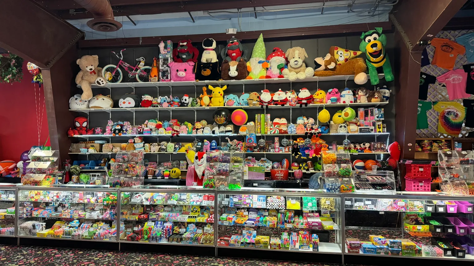 Billy Bob's Wonderland prize counter filled with colorful toys and games