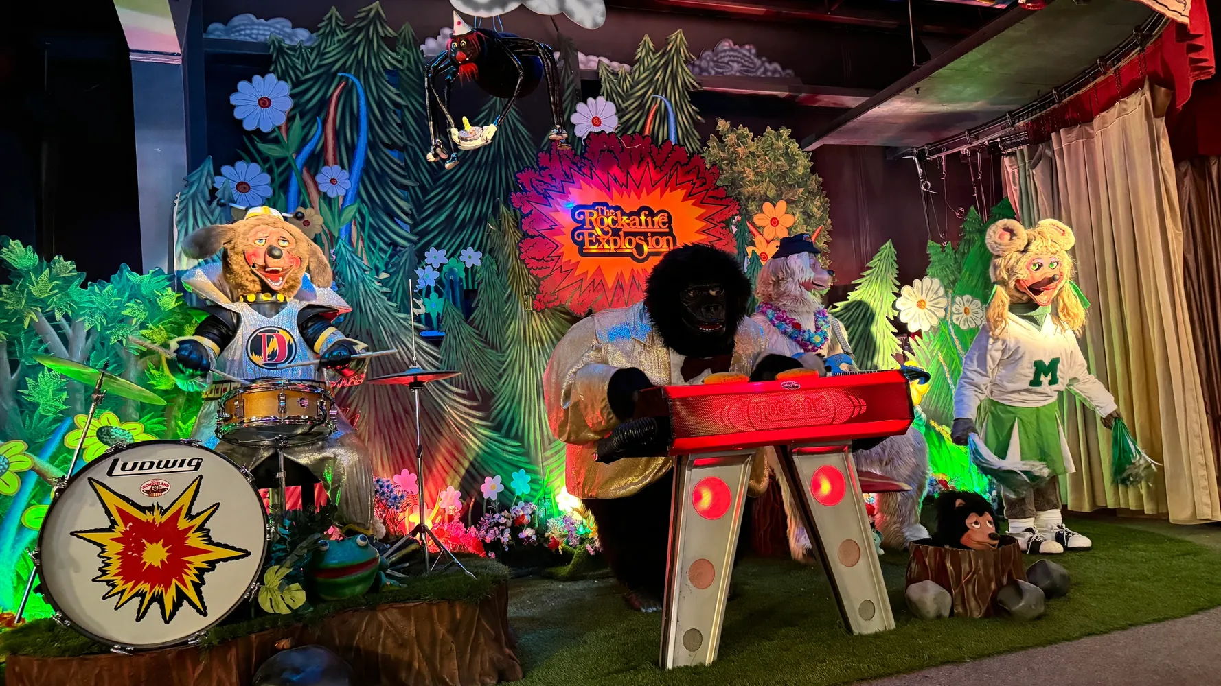 The colorful Rock-afire Explosion animatronic band on stage at Billy Bob's Wonderland