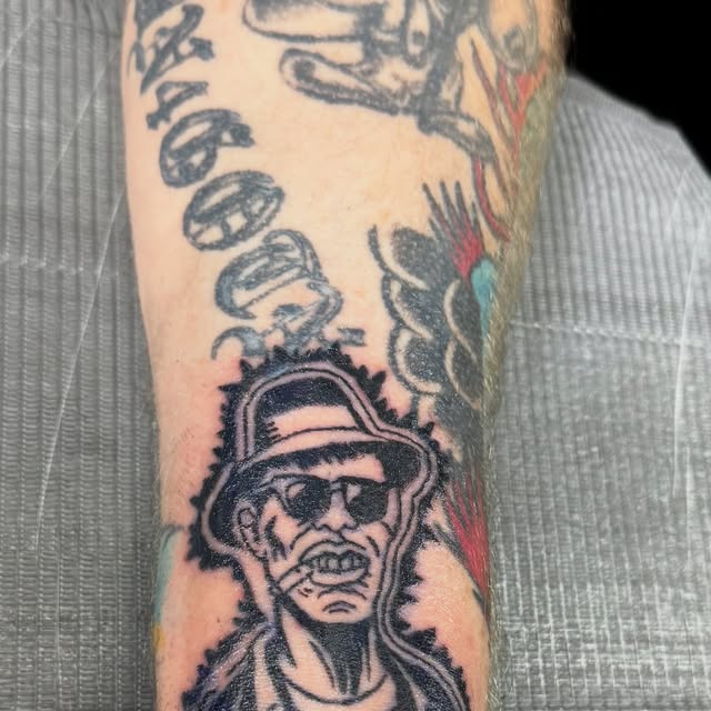 Lightnin’ Hopkins portrait tattoo by Derek Neal