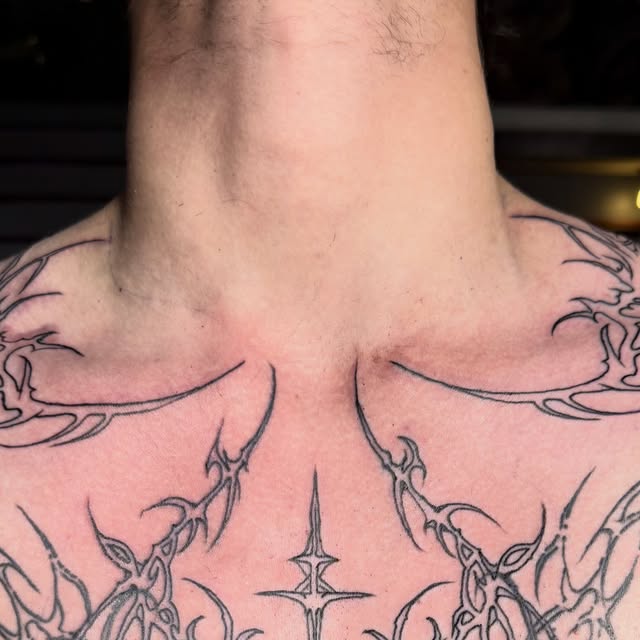 Cyber-sigilism chest tattoo by Gabe Barker